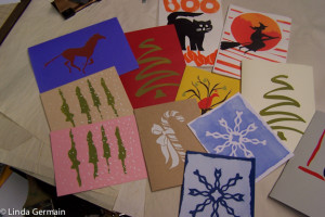 simple paper stencils used to make these screen printed cards