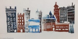 block print of cityscape based on drawing