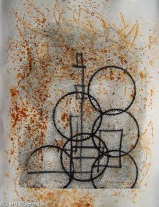 trace monoprint on rusted paper